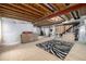 Spacious unfinished basement with exposed wood, awaiting personalized finishing touches at 20534 E Union Cir, Aurora, CO 80015