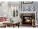 Cozy fireplace with decorative mantle and accents, enhancing the warmth of the living space at 20534 E Union Cir, Aurora, CO 80015