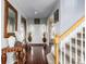 Elegant foyer with hardwood floors, staircase, and decorative accents, creating a grand entrance at 20534 E Union Cir, Aurora, CO 80015