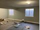 Unfinished basement with multiple windows providing natural light at 5866 W Asbury Pl, Lakewood, CO 80227