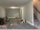 Unfinished basement with stairs at 5866 W Asbury Pl, Lakewood, CO 80227