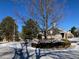 Community clubhouse and landscaping in winter at 5866 W Asbury Pl, Lakewood, CO 80227