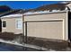 Attached garage with single car door at 5866 W Asbury Pl, Lakewood, CO 80227