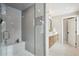Luxurious bathroom showcasing a glass-enclosed shower, vanity and elegant finishes at 6279 E Princeton Ave, Cherry Hills Village, CO 80111