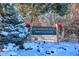 Community sign for Southmoor Vista at Cherry Hills Village, decorated for the winter holidays at 6279 E Princeton Ave, Cherry Hills Village, CO 80111