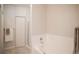 Bathroom features a large bathtub and shower at 6001 S Yosemite St # B206, Greenwood Village, CO 80111