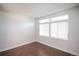 Bedroom with new laminate flooring and large windows at 6001 S Yosemite St # B206, Greenwood Village, CO 80111