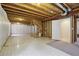 Unfinished basement with wood framing, exposed ductwork, and concrete floors at 616 Wild Ridge Cir, Lafayette, CO 80026