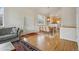 Bright dining area featuring hardwood floors and an adjacent kitchen space at 616 Wild Ridge Cir, Lafayette, CO 80026