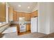 Well-maintained kitchen featuring ample counter space and white appliances at 616 Wild Ridge Cir, Lafayette, CO 80026