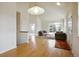 Bright and airy living room with high ceilings, hardwood floors, and a cozy seating arrangement at 616 Wild Ridge Cir, Lafayette, CO 80026