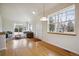 Spacious living room featuring large windows and hardwood floors at 616 Wild Ridge Cir, Lafayette, CO 80026