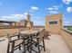 Gather around the rooftop patio table, perfect for al fresco dining and relaxation at 2468 Channel Dr, Highlands Ranch, CO 80129