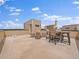 Inviting rooftop patio with a dining table and comfortable seating area at 2468 Channel Dr, Highlands Ranch, CO 80129