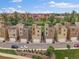 Attractive townhomes feature contemporary design, garages, and well-maintained landscaping at 2468 Channel Dr, Highlands Ranch, CO 80129
