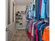 Walk-in closet that is well-organized and spacious, with shelving for storage at 2468 Channel Dr, Highlands Ranch, CO 80129