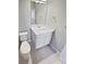 Clean bathroom with white vanity, single sink, and tiled floor at 14948 E Belleview Ave, Aurora, CO 80015