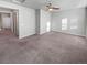 Bright and spacious bedroom with carpeted floor and ceiling fan at 14948 E Belleview Ave, Aurora, CO 80015