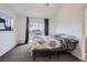 Bright bedroom features a balcony access with plenty of natural light at 4760 S Wadsworth Blvd # M302, Littleton, CO 80123