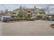 Charming condo building with assigned parking and well-maintained landscaping, perfect for convenient living at 4760 S Wadsworth Blvd # M302, Littleton, CO 80123