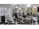 Community gym with state-of-the-art weight training equipment, mirrors, and natural light at 4760 S Wadsworth Blvd # M302, Littleton, CO 80123