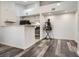 Open concept kitchen with modern appliances and ample counter space, adjacent to dining area for easy entertaining at 4760 S Wadsworth Blvd # M302, Littleton, CO 80123