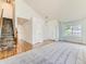 Bright living room showcasing vaulted ceilings, hardwood floors, and lots of natural light at 13472 Columbine Cir, Thornton, CO 80241