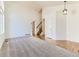 Spacious living room featuring neutral colored walls, hardwood floors, and lots of natural light at 13472 Columbine Cir, Thornton, CO 80241