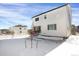 House exterior with backyard in winter at 2523 Villageview Ln, Castle Rock, CO 80104