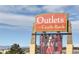 Large sign for Outlets at Castle Rock, showcasing nearby shopping at 2523 Villageview Ln, Castle Rock, CO 80104