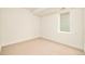 Cozy bedroom with neutral carpet and a well lit window at 2738 N Clay St, Denver, CO 80211
