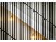 Close-up of a modern staircase with black railings and stylish lighting fixtures at 2738 N Clay St, Denver, CO 80211