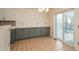 Bright dining area with tile floors, patio access, and ample natural light at 23955 Glenmoor Way, Parker, CO 80138
