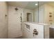 Stylish bathroom featuring an elegant shower design and modern fixtures at 23955 Glenmoor Way, Parker, CO 80138