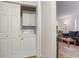Convenient laundry closet with washer, dryer, and additional storage space at 3390 S Elm St, Denver, CO 80222