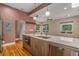 Bright kitchen showcasing quartz countertops, stainless steel appliances, and stylish light fixtures at 4144 Tennyson St # 10, Denver, CO 80212