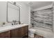 This beautifully renovated bathroom boasts modern fixtures, stylish vanity, and sleek tile work for a spa-like feel at 9408 Harvard Dr, Highlands Ranch, CO 80130