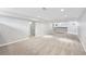 Spacious finished basement area featuring neutral carpet, recessed lighting, and a dry bar for entertaining at 1632 S Josephine St, Denver, CO 80210