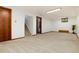 Large basement with carpet flooring, with natural light and a closet for storage at 3061 S Marion St, Englewood, CO 80113