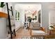 Cozy living room featuring hardwood floors, throw blanket on ladder, and inviting natural light at 3061 S Marion St, Englewood, CO 80113