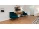 Bright living room with hardwood floors, modern furniture, and art display creating a welcoming atmosphere at 3061 S Marion St, Englewood, CO 80113