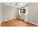 Serene bedroom with hardwood floors, ceiling fan, neutral paint, and window with natural light at 2259 Meade St, Denver, CO 80211