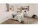 Cozy bedroom showcases natural light and neutral tones to create a relaxing space at 2259 Meade St, Denver, CO 80211