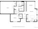 Detailed floorplan showing layout of first floor, including garage, bedroom, living spaces, and kitchen at 6111 W 28Th Ct, Wheat Ridge, CO 80214