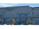 Modern building exterior with large windows and PEAK signage at 15945 E Geddes Dr # 54, Aurora, CO 80016
