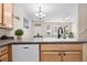 Kitchen with island, stainless steel appliances, and wood cabinets at 15945 E Geddes Dr # 54, Aurora, CO 80016