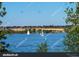 Scenic lake view with sailboats under a clear blue sky at 15945 E Geddes Dr # 54, Aurora, CO 80016