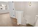 Elegant staircase with light beige colored walls at 15945 E Geddes Dr # 54, Aurora, CO 80016