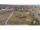 Aerial view of a large community sports field showcasing proximity to neighborhoods and roadways at 5747 S Lowell Blvd, Littleton, CO 80123