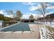 View of the community pool, with adjacent building and townhomes in the background at 5747 S Lowell Blvd, Littleton, CO 80123